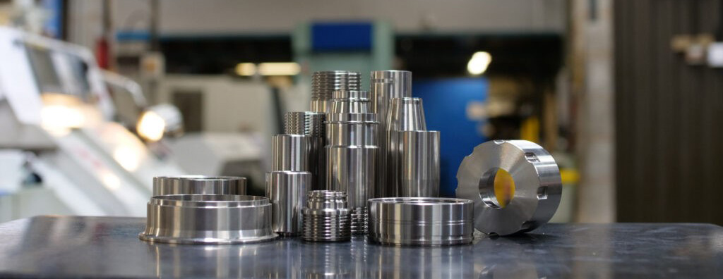 Turned stainless steel components on a table