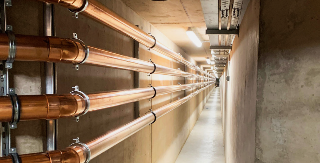 Four medical gas copper pipes in situ